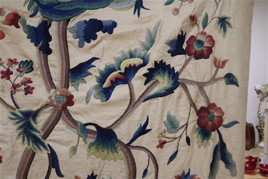 A crewel worked panel and another similar in green